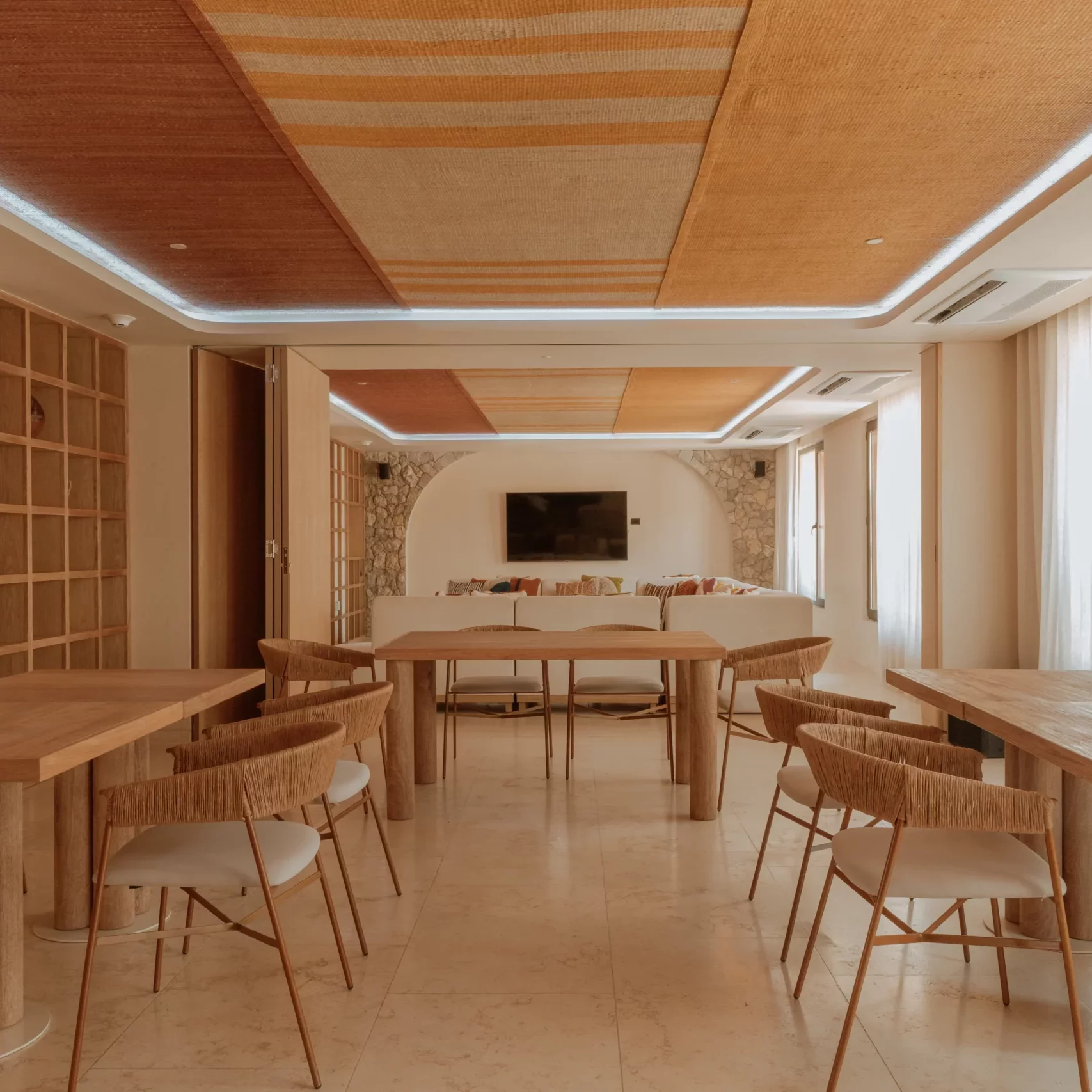 Meeting room with wooden tables and natural décor at hotel in Cartagena